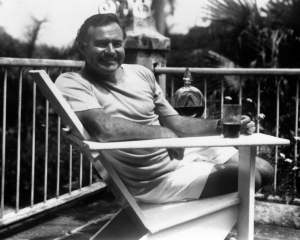 Ernest Hemingway, possibly leaving a stain on his six-word story. (image via wikimedia)