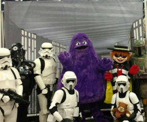 Everybody would have Grimaced if they'd seen what was going on behind them.